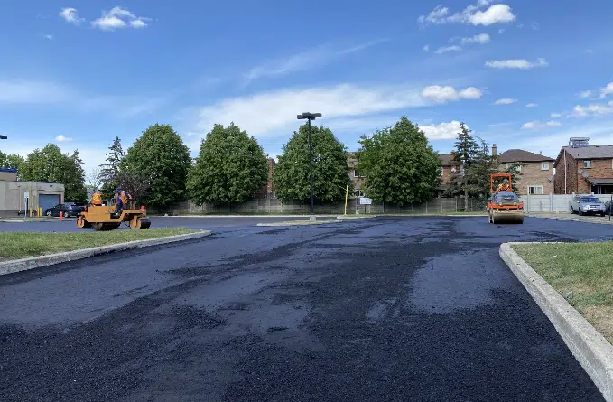 Finished asphalt paving on a commercial parking lot in Bowmanville, ON.