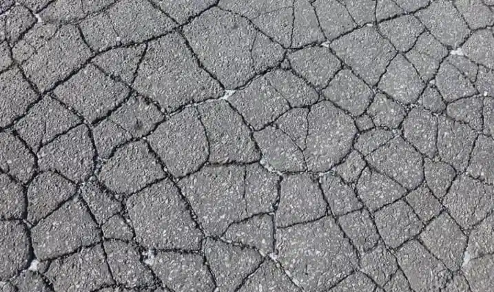 What Is the Difference Between Asphalt Resurfacing and Patching?