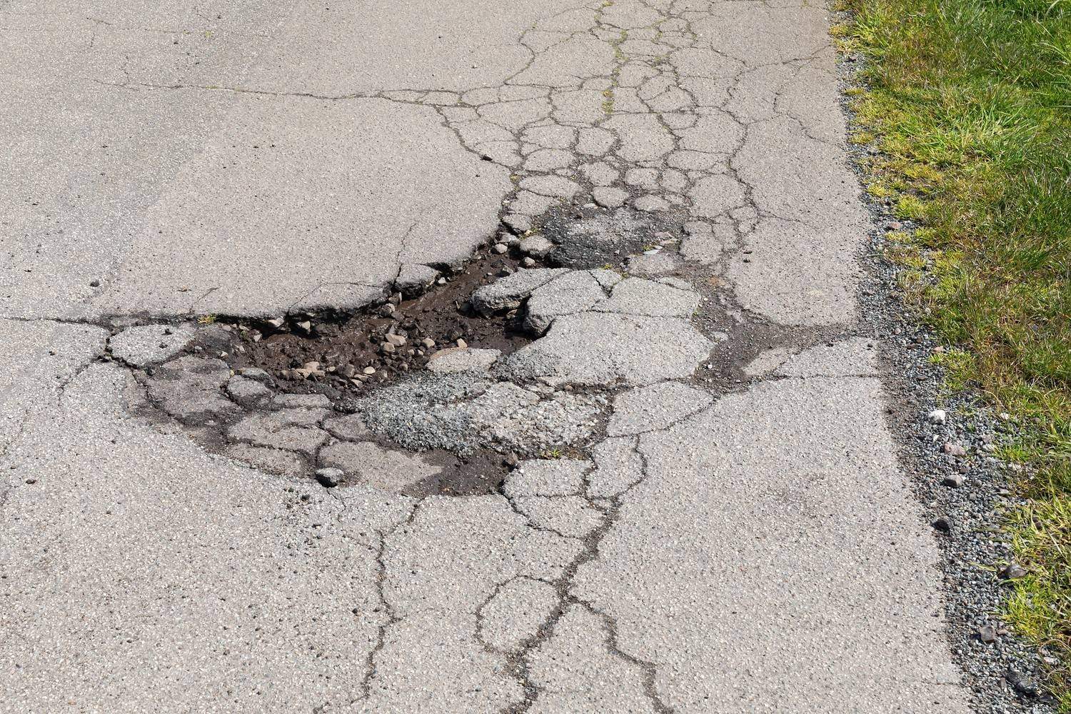 asphalt rutting and cracking school bus loading zone Ontario